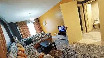 82-inch LCD TV with premium TV channels, TV