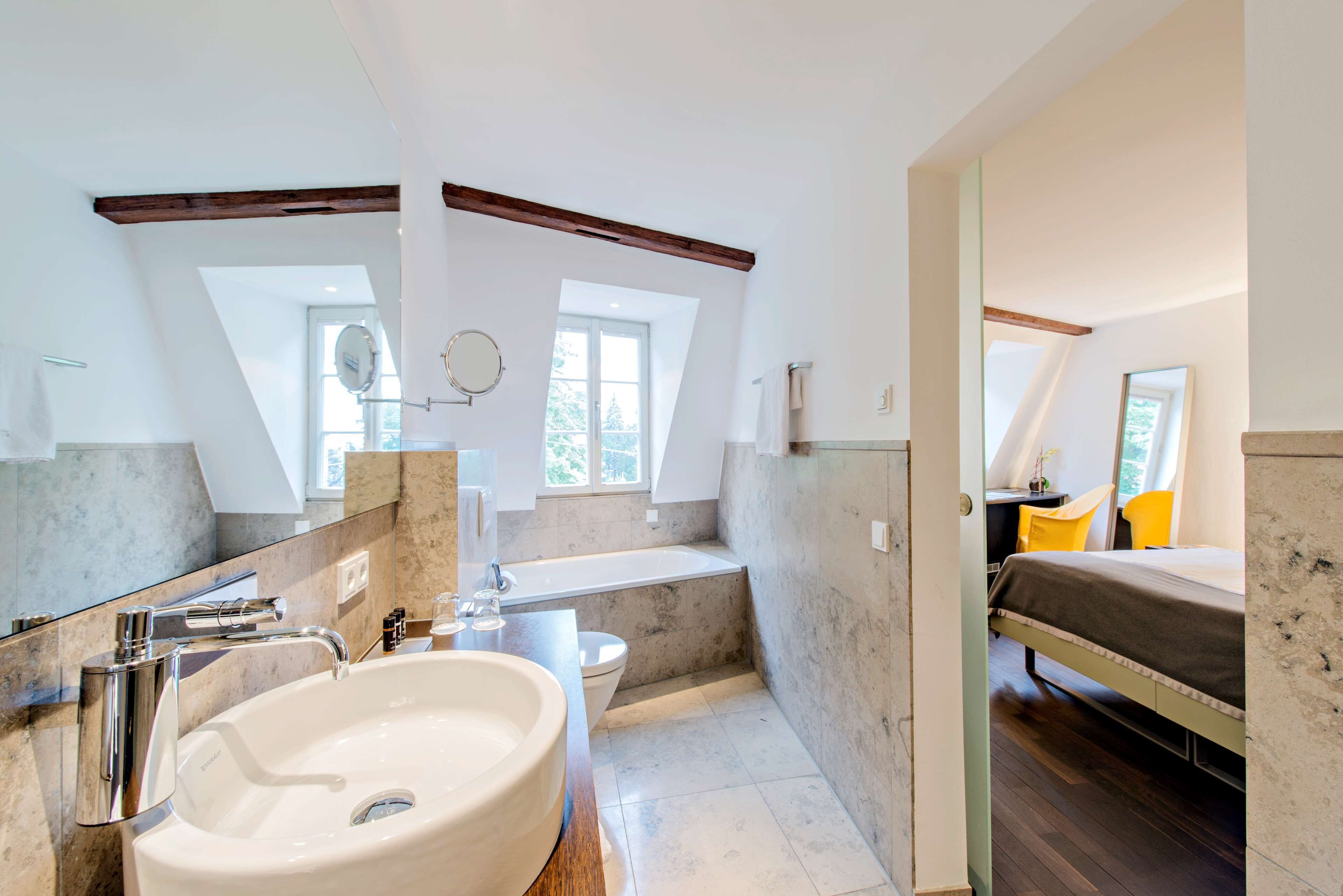 separate bathtub and shower, free toiletries, hair dryer, slippers