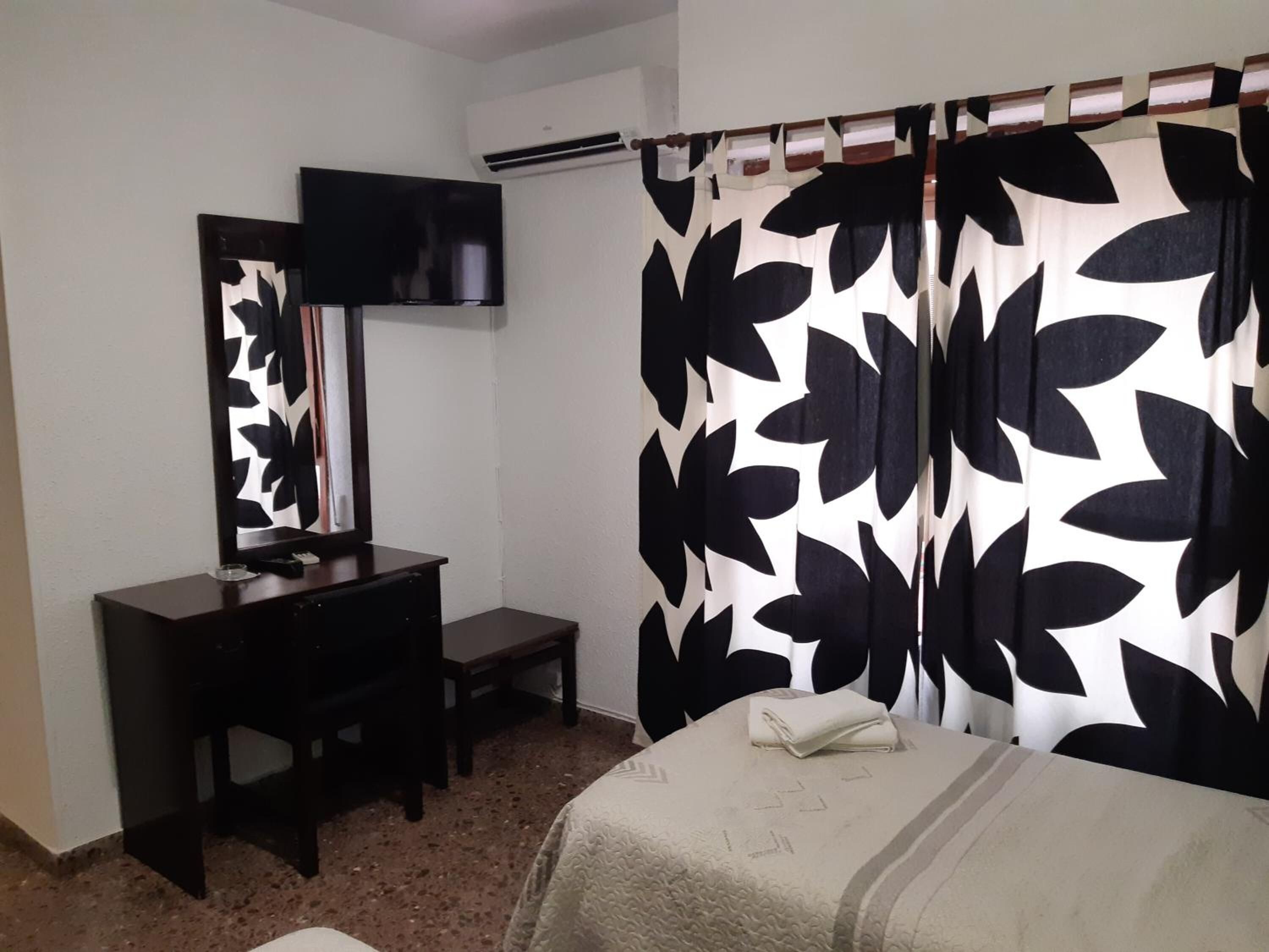 desk, free cots/infant beds, free wifi, bed sheets