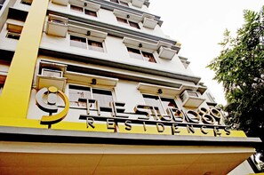 A multi-story building with a sign reading "THE SUBWAY RESIDENCES". - Studio 89 Katipunan QC (Quezon City)