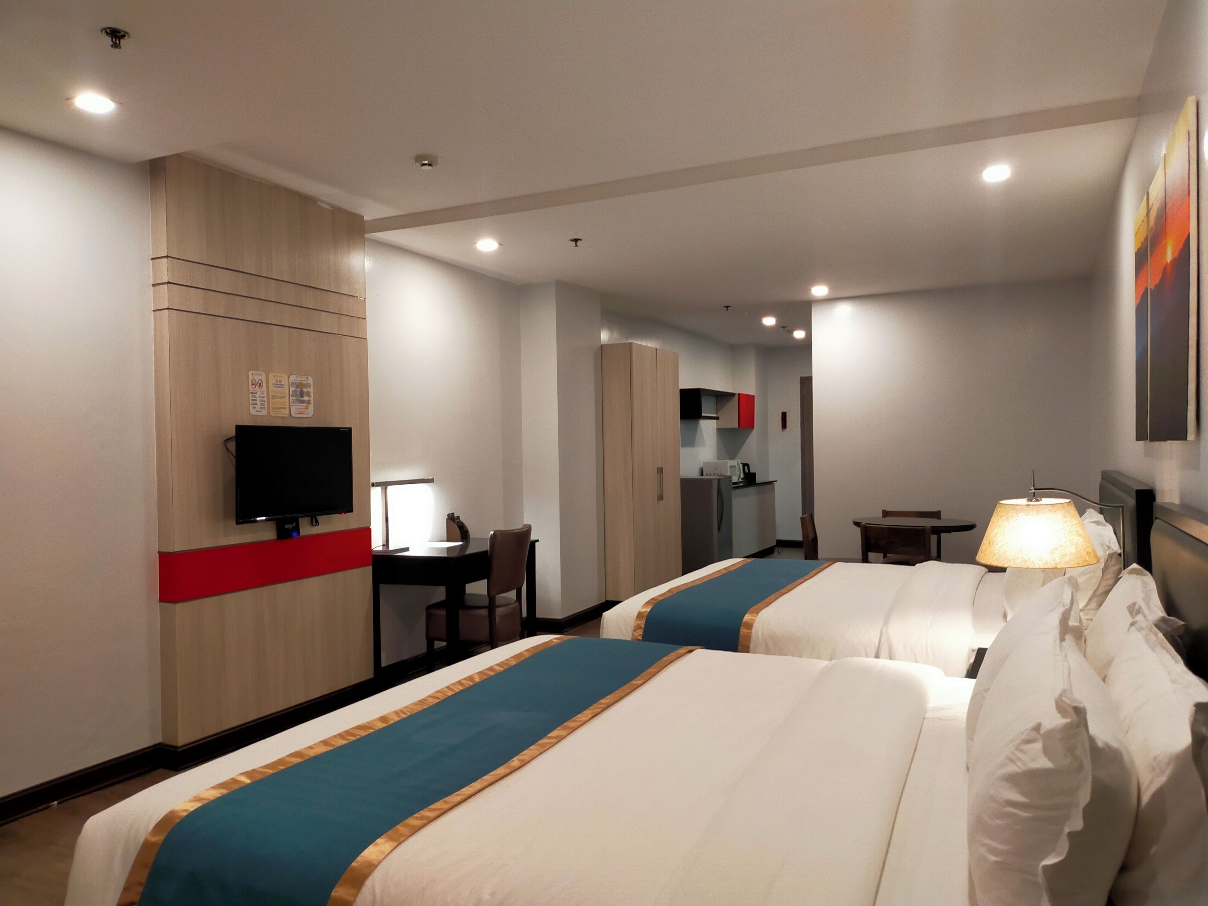 family room | desk, blackout curtains, rollaway beds, free wifi