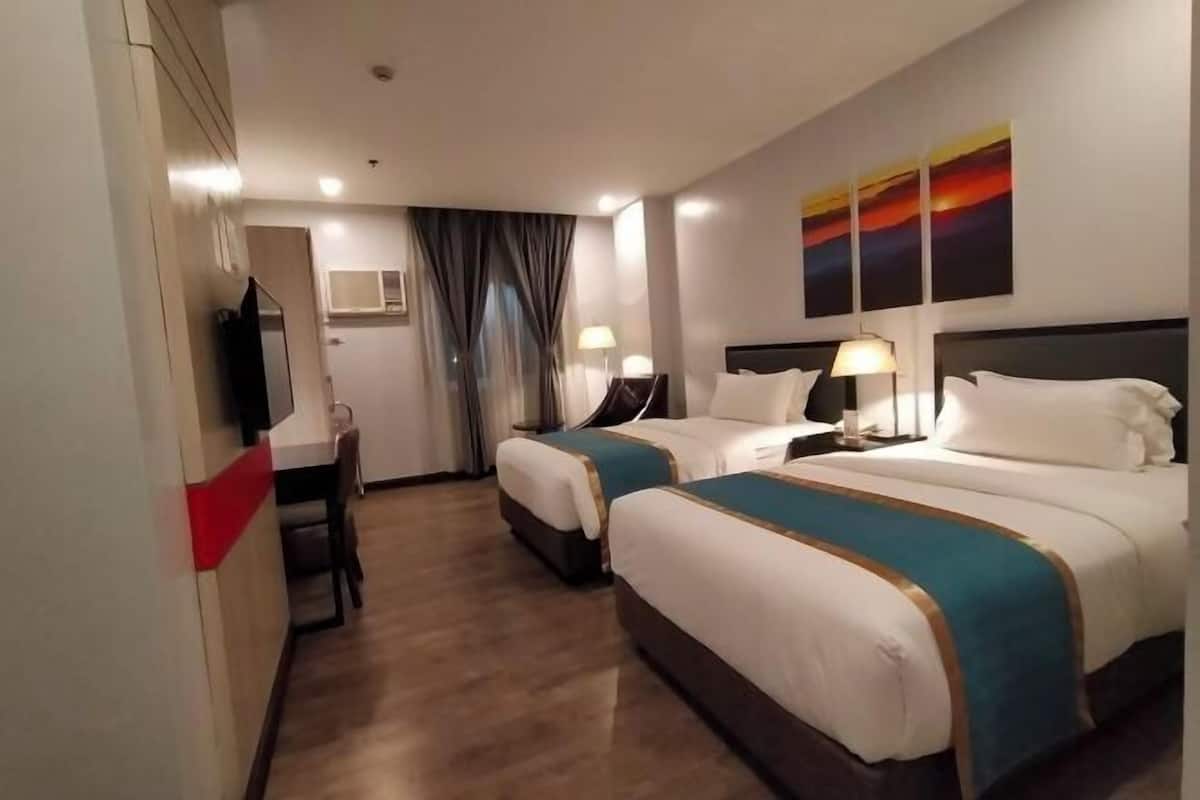 Desk, blackout drapes, rollaway beds, free WiFi