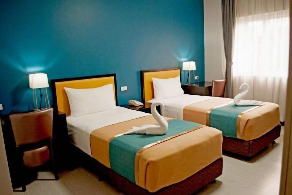 Desk, blackout drapes, rollaway beds, free WiFi