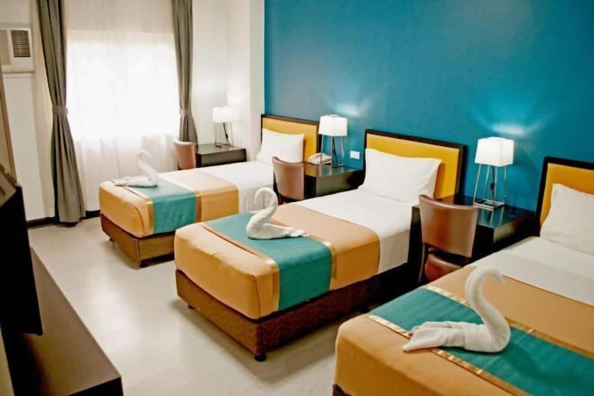 Desk, blackout drapes, rollaway beds, free WiFi