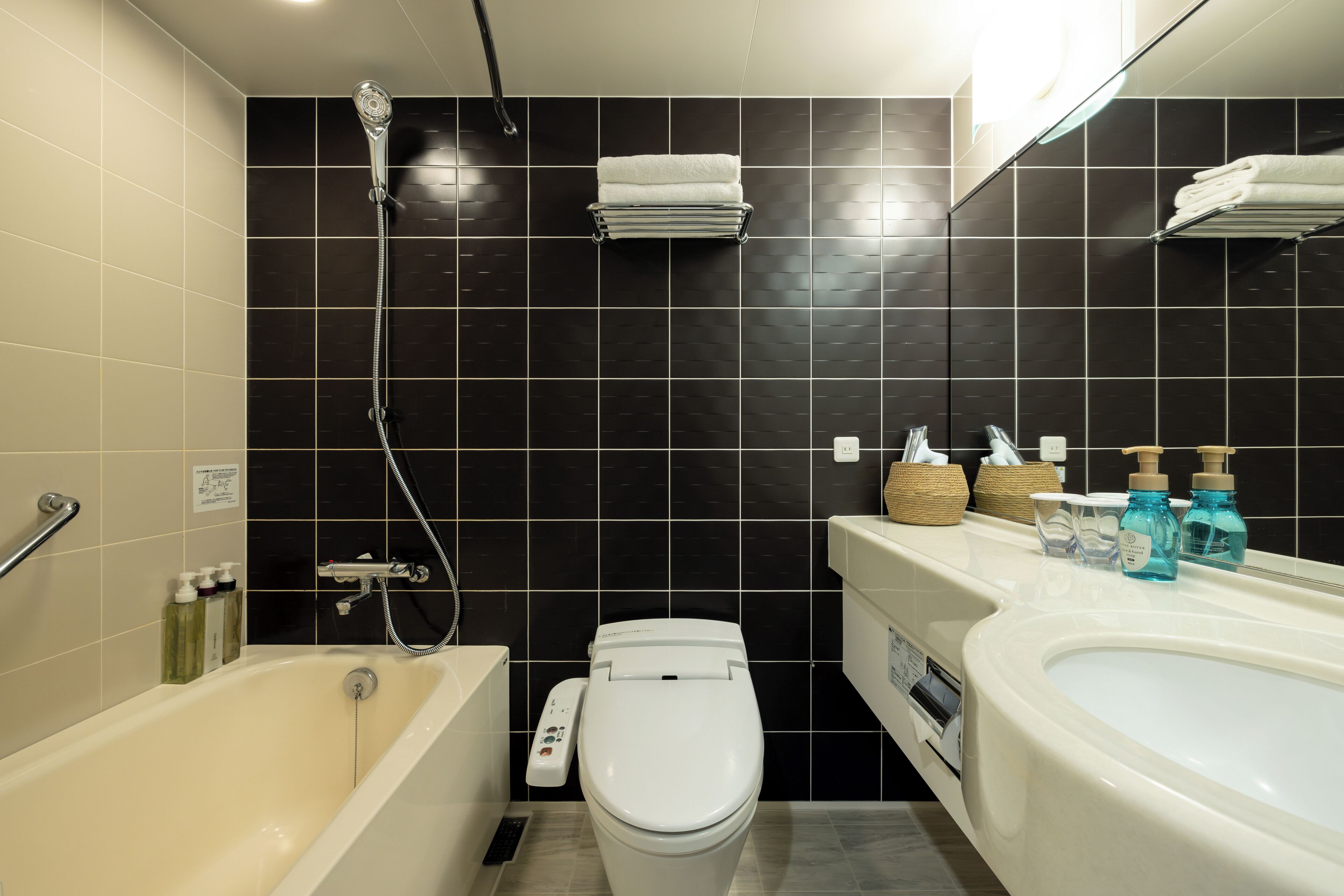 combined shower/bathtub, free toiletries, hair dryer, slippers