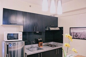 Basic Apartment, 1 Bedroom | Private kitchen | Full-size fridge, microwave, stovetop, dishwasher - 1BR Condominium at Avida Towers Cebu IT Park (Cebu City)