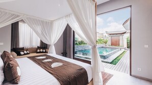 A bedroom with a large bed, white curtains, and a view of a swimming pool. - Daun Lebar Villas (Payangan)