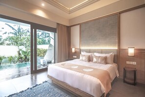 A spacious bedroom with a large bed, a view of a swimming pool, and a sliding glass door leading to an outdoor area. - Daun Lebar Villas (Payangan)