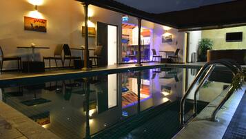 Indoor pool, a rooftop pool, sun loungers