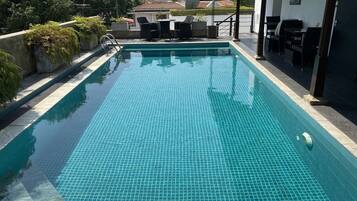 Indoor pool, a rooftop pool, sun loungers