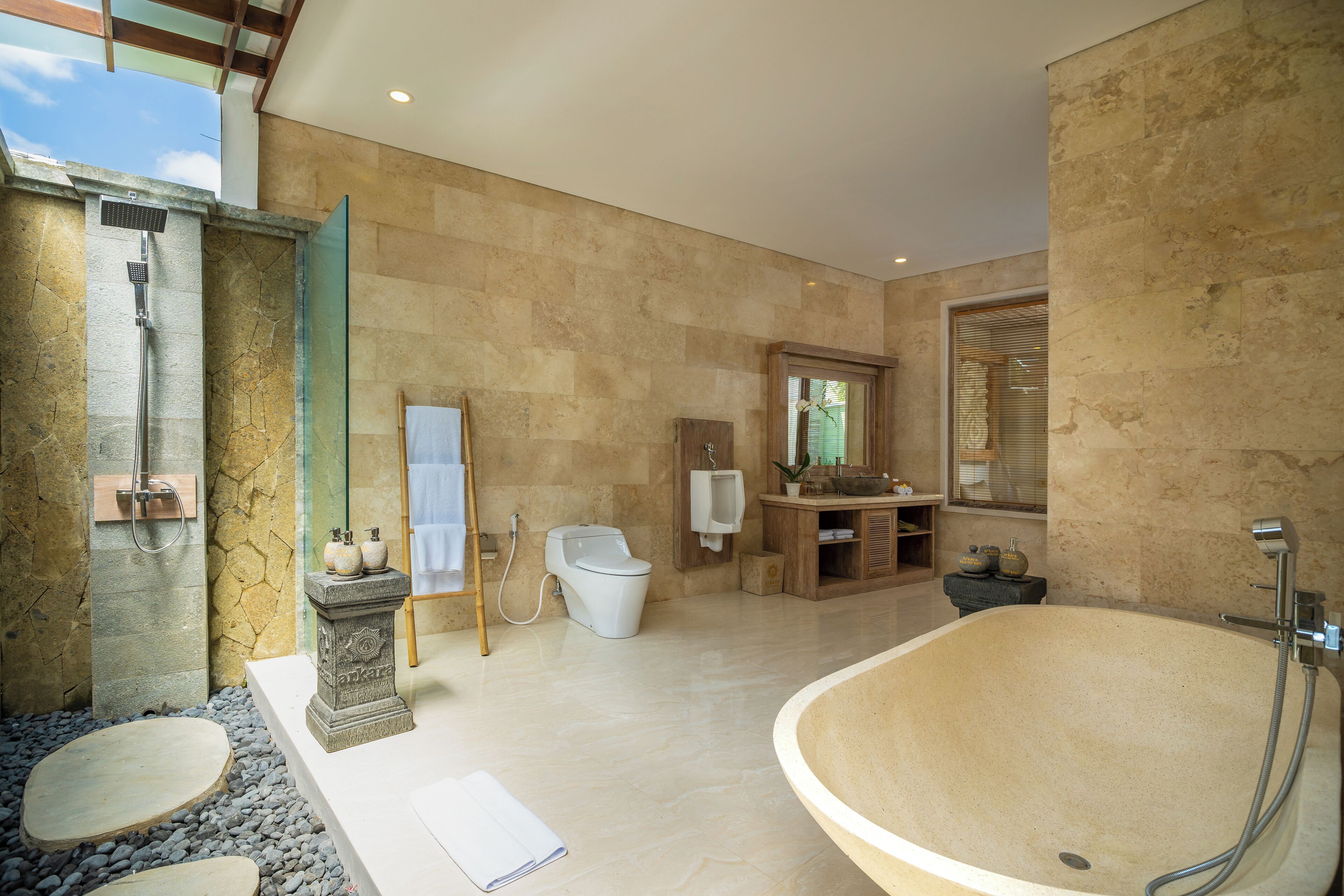 separate bathtub and shower, deep-soaking bathtub, designer toiletries