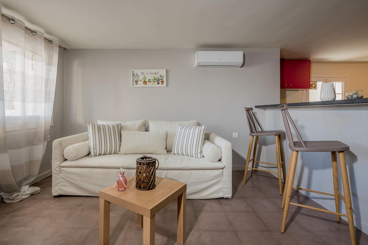 Apartment, 1 Bedroom, Ground Floor (Mars) | Living area | Smart TV, iPod dock