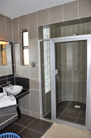 Shower, rainfall showerhead, eco-friendly toiletries, hair dryer