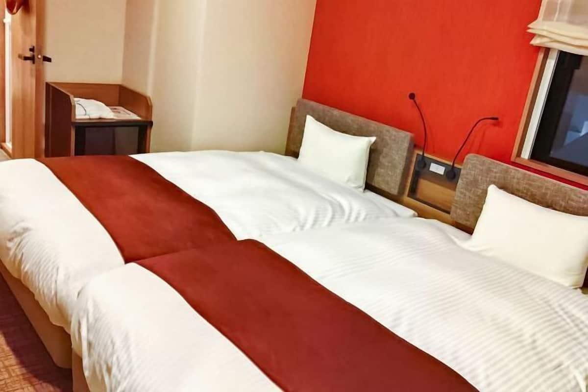 Memory-foam beds, in-room safe, blackout curtains, iron/ironing board