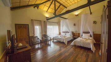 Deluxe Bungalow Family Room | Minibar, in-room safe, desk, free WiFi