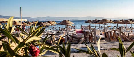 Private beach, beach shuttle, sun-loungers, beach umbrellas