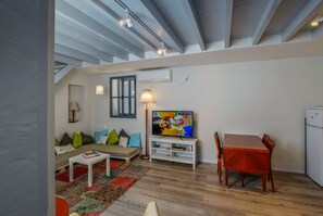 City Apartment, 3 Bedrooms, Courtyard Area | Living area | Flat-screen TV