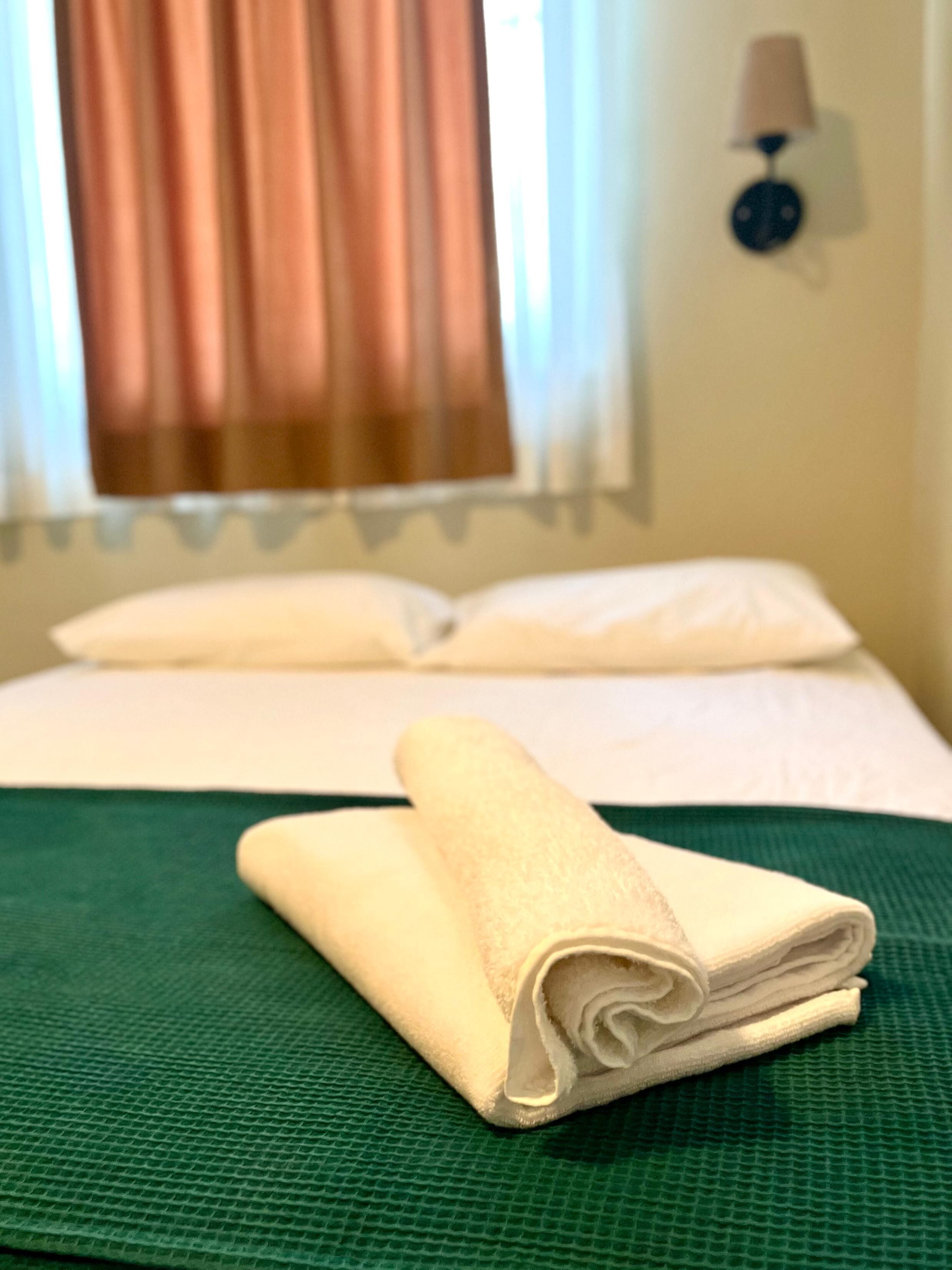 basic studio | egyptian cotton sheets, premium bedding, memory-foam beds, desk