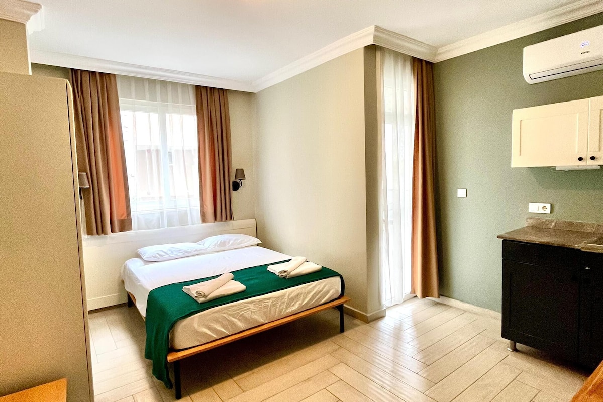 basic studio | egyptian cotton sheets, premium bedding, memory-foam beds, desk