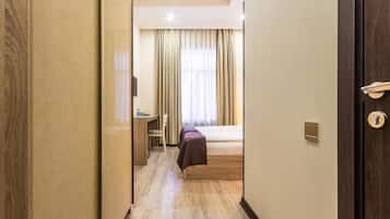 Ropa de cama de alta calidad y minibar