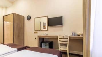 Habitación estándar con 2 camas individuales | Ropa de cama de alta calidad y minibar