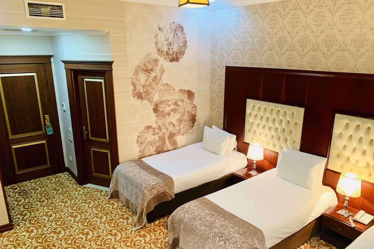 Ropa de cama de alta calidad y minibar