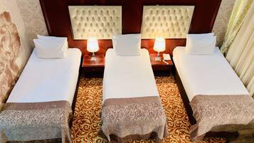 Standard Triple Room | 1 bedroom, premium bedding, minibar, in-room safe