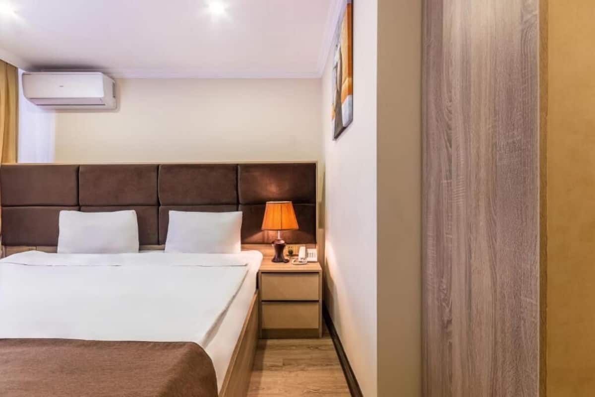 Standard Double Room | Premium bedding, minibar, in-room safe, individually decorated