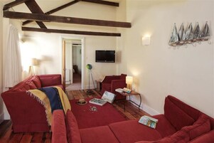 Cottage, 3 Bedrooms, Sea View | Living room | Flat-screen TV, DVD player, iPod dock