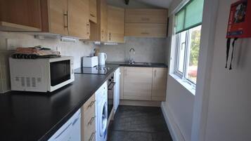 Cottage, 3 Bedrooms, Sea View | Private kitchen | Fridge, microwave, oven, stovetop