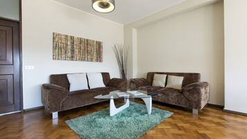 Apartment, 5 Bedrooms, Balcony, City View | Living room | Flat-screen TV, fireplace, DVD player