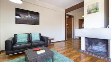 Apartment, 5 Bedrooms, Balcony, City View | Living area | Flat-screen TV, fireplace, DVD player