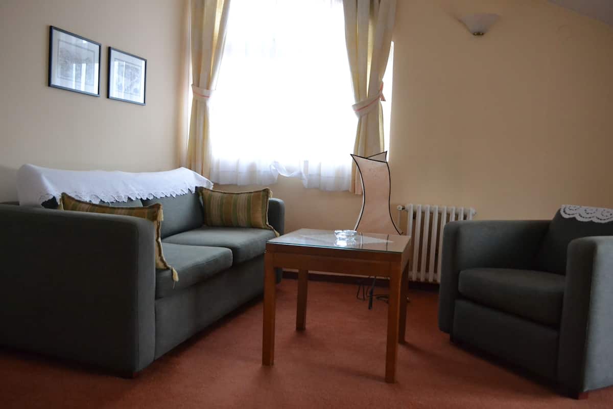 Appartement, 1 chambre | Coin séjour