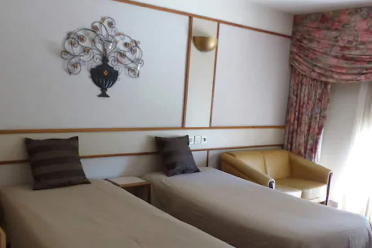 Chambre avec lits jumeaux