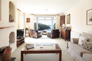 Apartment, 4 Bedrooms, 2 Bathrooms, Sea View | Living room | Flat-screen TV, DVD player, iPod dock