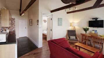 Cottage, 1 Bedroom | Living room | Flat-screen TV, DVD player, iPod dock