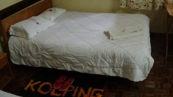 Triple Room | Desk, blackout curtains, bed sheets