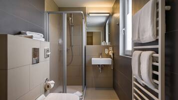 Apartment, 1 Bedroom | Bathroom | Shower, free toiletries, hair dryer, towels