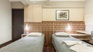 Desk, blackout curtains, free WiFi, bed sheets