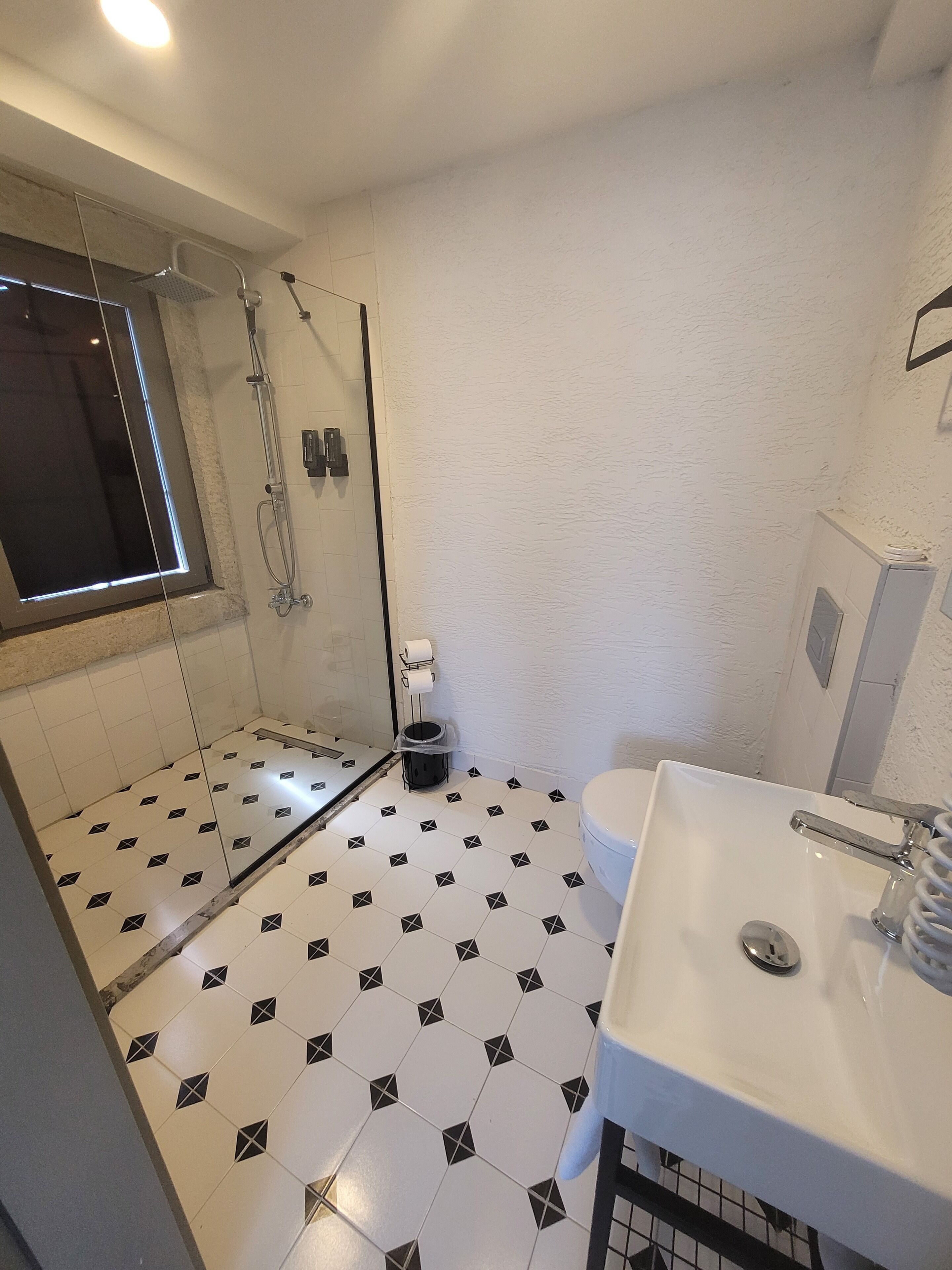 comfort triple room, multiple beds | bathroom | shower, designer toiletries, hair dryer, slippers