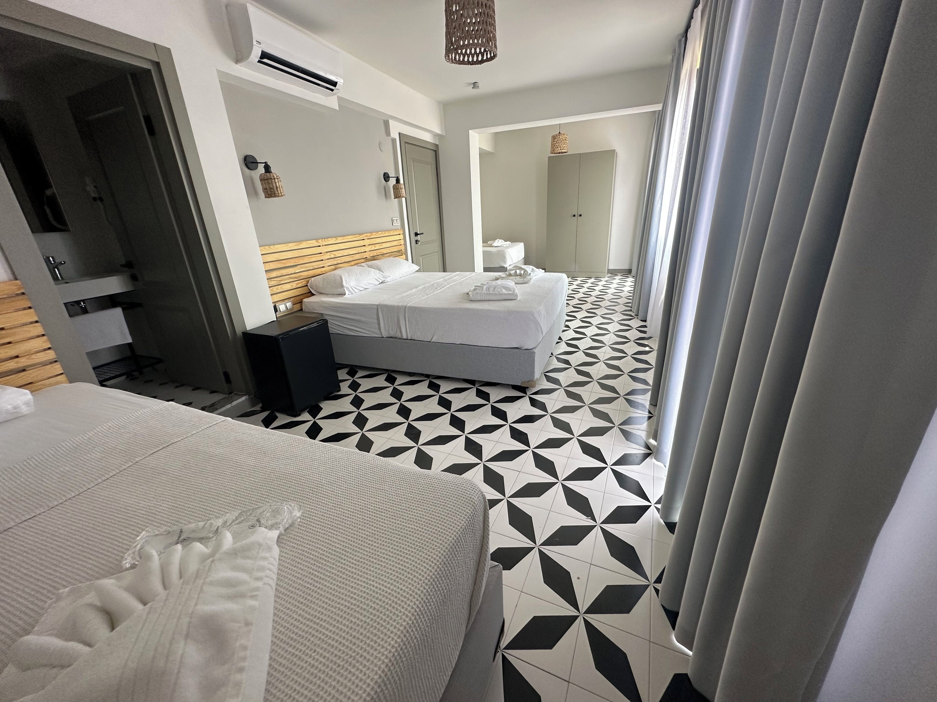 family quadruple room, balcony, garden view | 1 bedroom, minibar, iron/ironing board, free wifi