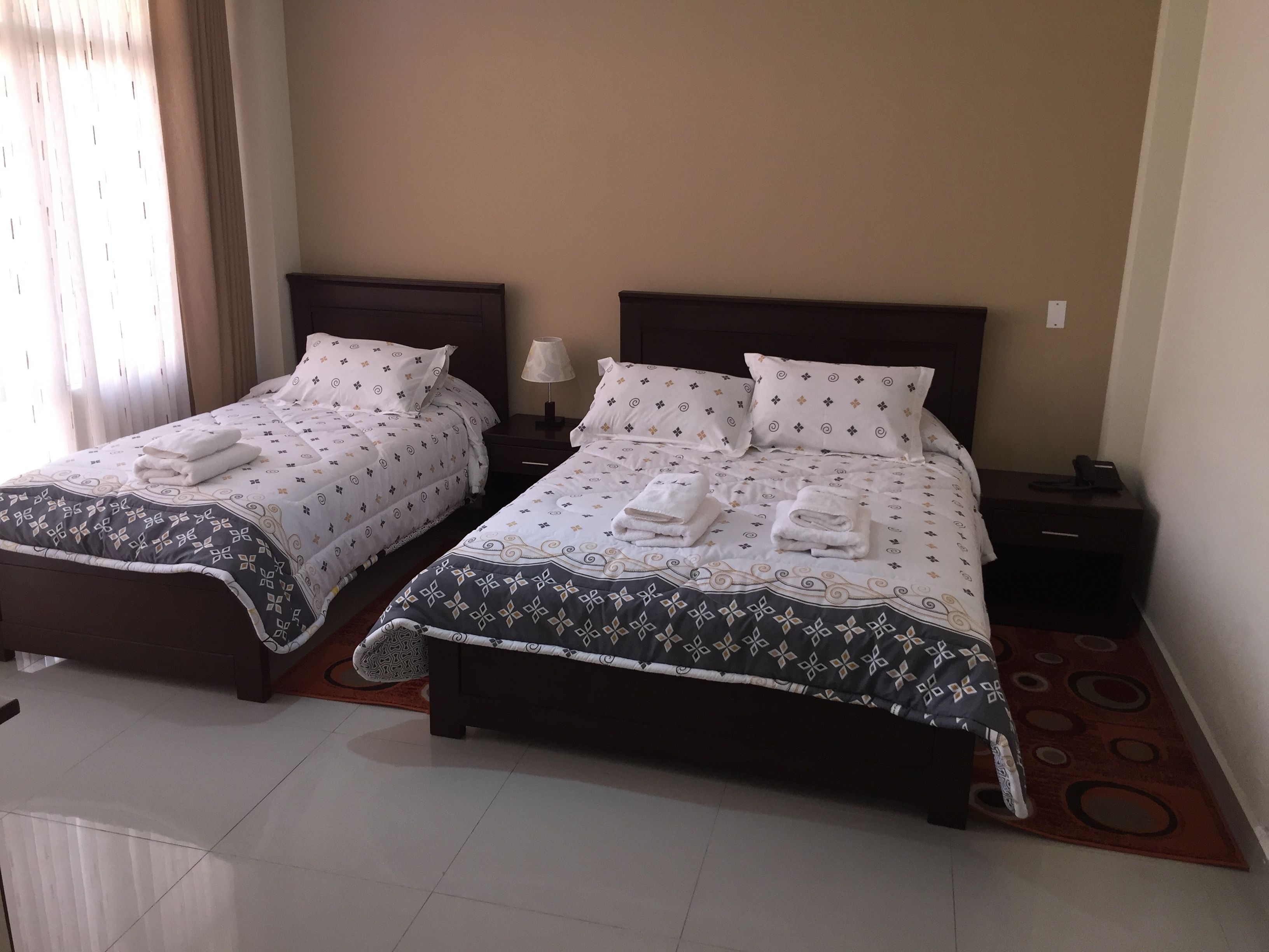 family room | in-room safe, iron/ironing board, free cots/infant beds, free wifi
