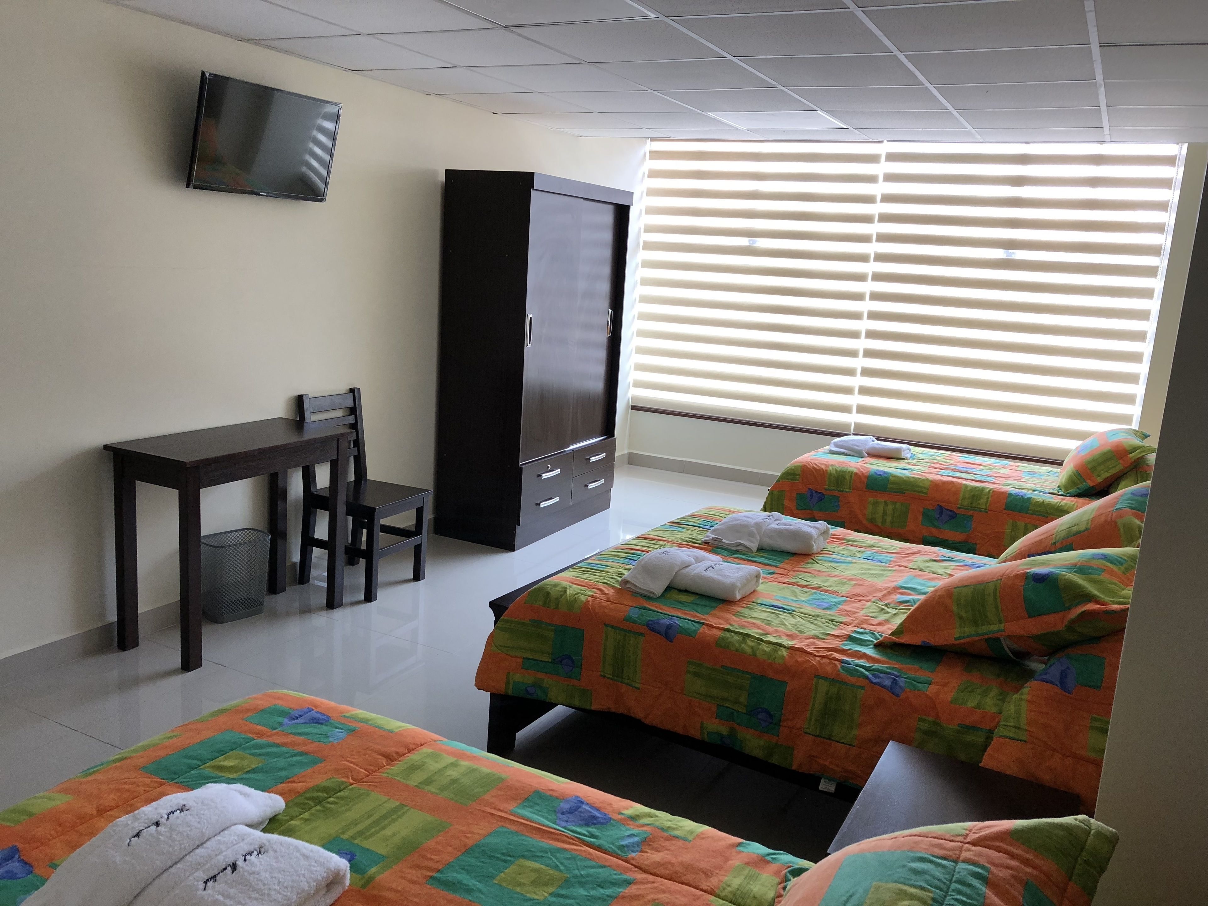 family quadruple room | in-room safe, iron/ironing board, free cots/infant beds, free wifi