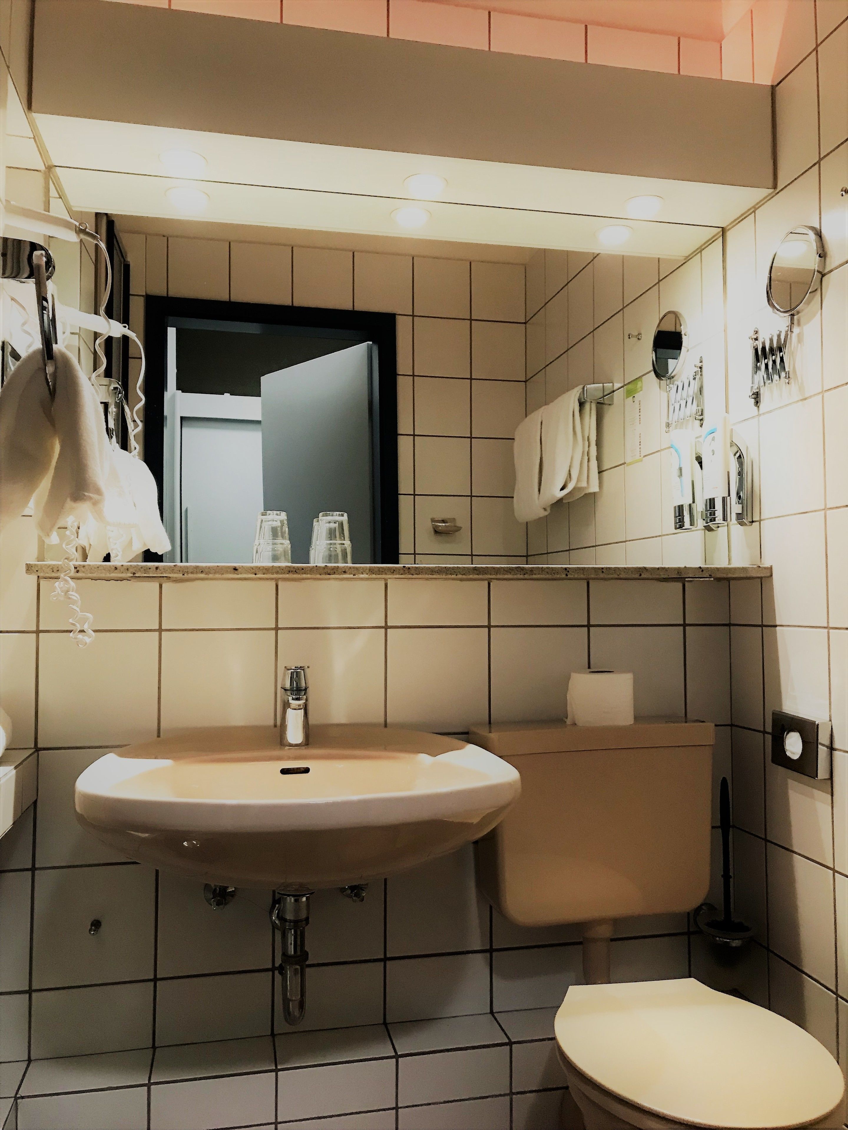 shower, hair dryer, bathrobes, slippers