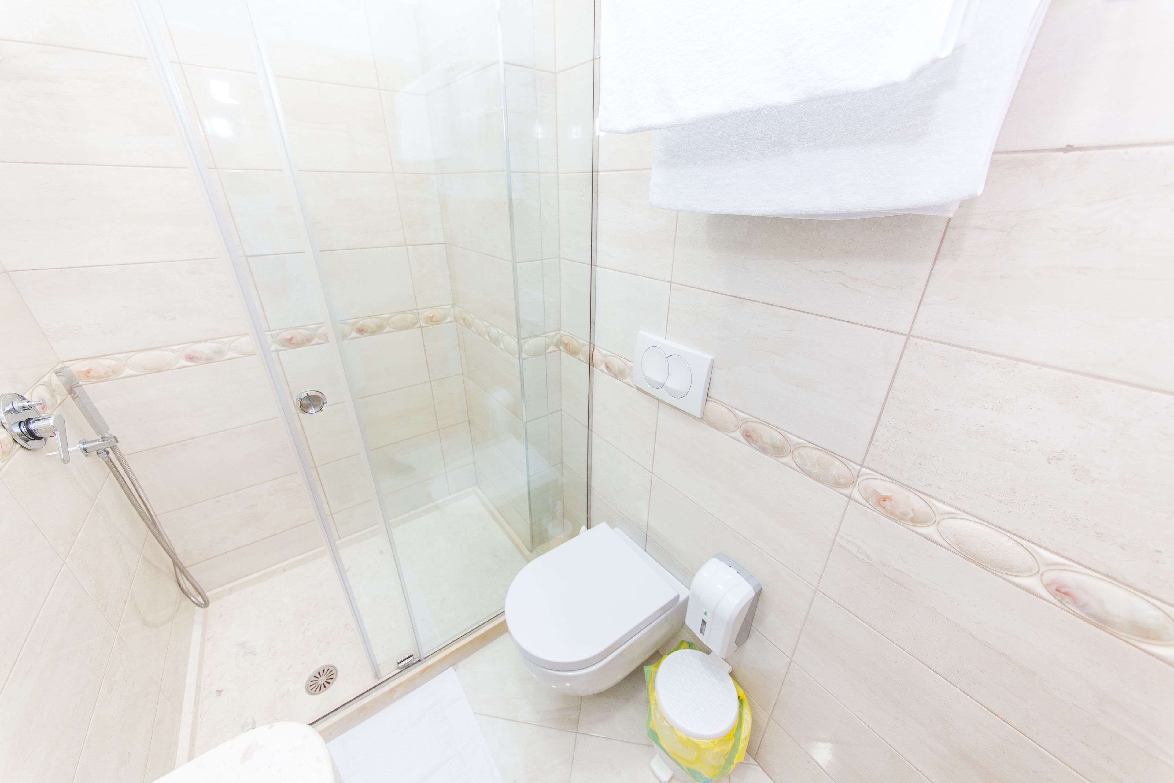 standard double room, 1 queen bed | bathroom | shower, free toiletries, hair dryer, slippers