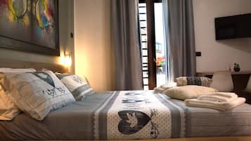 Standard Quadruple Room, Non Smoking | Frette Italian sheets, premium bedding, individually decorated