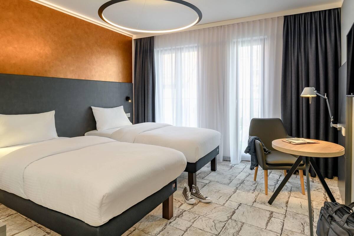 comfort twin room, 2 single beds | hypo-allergenic bedding, in-room safe, soundproofing, free wifi