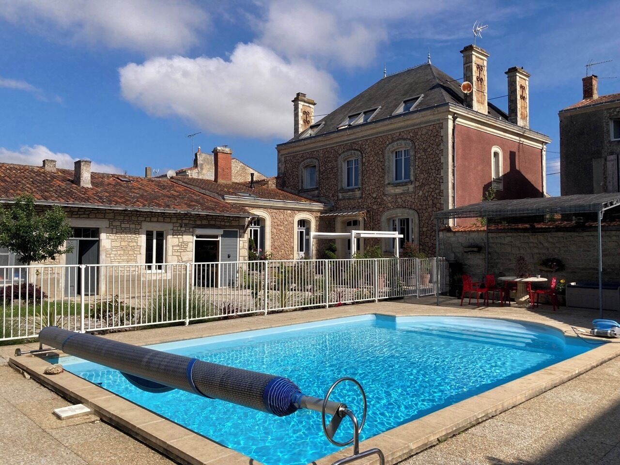 Seasonal outdoor pool, open 10:00 AM to 7:00 PM, pool umbrellas