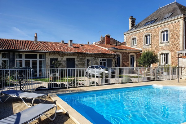 Seasonal outdoor pool, open 10:00 AM to 7:00 PM, pool umbrellas