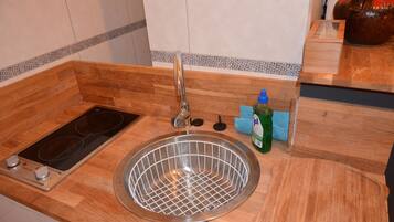 Apartment, 1 Bedroom | Private kitchen | Fridge, microwave, coffee/tea maker, electric kettle